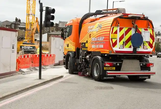 Waste collection sweeper